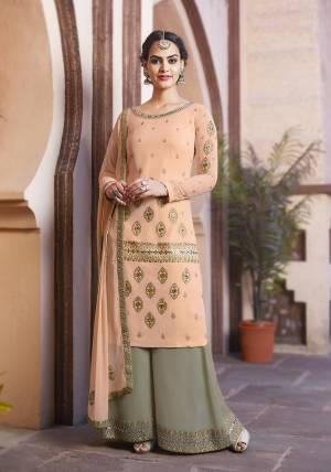 Summer Is About Subtle Shades And Pastel Play. So Grab This Very Beautiful Designer Sharara Suit In Peach Colored Top And Dupatta Paired With Pastel Green Colored Bottom, Its Pretty Embroidered Top And bottom Are Fabricated On Georgette Paired With Chiffon Dupatta. 