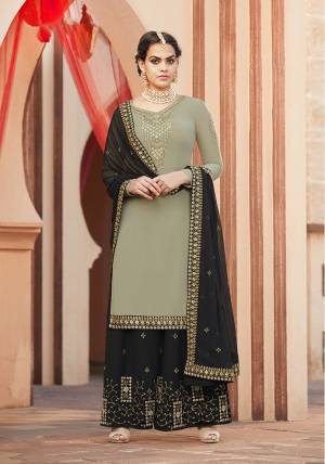 Unique Color Pallete Of Pastel And Bold Is Here With This Designer Sharara Suit In Pastel Green Colored Top Paired With Black Colored Bottom And Dupatta. Its Top And Bottom Are Fabricated On Georgette Paired With Chiffon Fabricated Dupatta. 