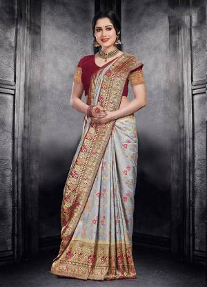 This Festive Season Look The Most Elegant Of All Wearing This Designer Silk based Saree Beautified With Weave All Over. This Saree Is Light Weight, Durable And Easy To Carry Throuhout The Gala