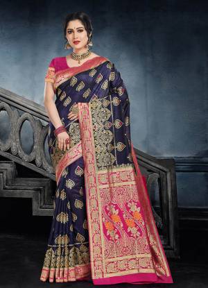 This Festive Season Look The Most Elegant Of All Wearing This Designer Silk based Saree Beautified With Weave All Over. This Saree Is Light Weight, Durable And Easy To Carry Throuhout The Gala