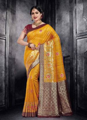 Look Pretty In This Designer Silk Based Saree Beautified With Heavy Weave All Over. Its Rich Fabric And Attractive Weabe Will Earn You Lots Of Compliments From Onlookers.