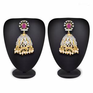 or Your Heavy Traditionals, Grab This Beautiful And Attractive Looking Earrings Set In Golden Color Beautified With Stone Work. This Can Be Paired With Any Colored Attire. 