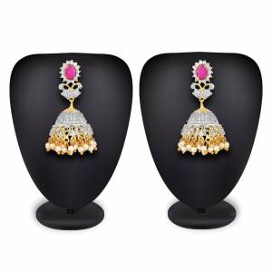 or Your Heavy Traditionals, Grab This Beautiful And Attractive Looking Earrings Set In Golden Color Beautified With Stone Work. This Can Be Paired With Any Colored Attire. 