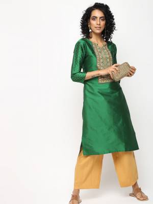 Celebrate This Festive Season With Beauty And Comfort Wearing This Designer Readymade Kurti In Dark GreenColor Fabricated On Tafeta Art Silk Beautified With Prints And Stone Work. 