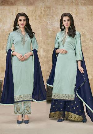 Go With The Pretty Shades Of Blue With This Designer Suit In Sky Blue Colored Top And Bottom Paired With Another Navy Blue Colored Bottom And Dupatta. Its Pretty Embroidered Top Is Fabricated On Satin Georgette With An Embroidered Santoon Bottom. Its Another Bottom Is Fabricated On Banarasi Jacquard Paired With Chiffon Fabricated Dupatta. 