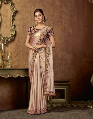 This ready-to-wear pre pleated saree is customised uniquely for the new age diva. Keep the look clean and sleek with  simple jewels and neat hairdo. 