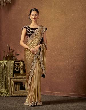 A little drama added on the shoulders  with delicate embellishments makes this saree a standout piece. Opt for a side bun and your favourite jewels to look enchanting.