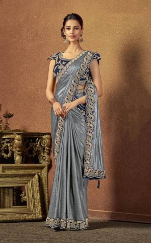 Crafted with attention to details and design, adorn this stylish pre-pleated saree and look like a style diva. 