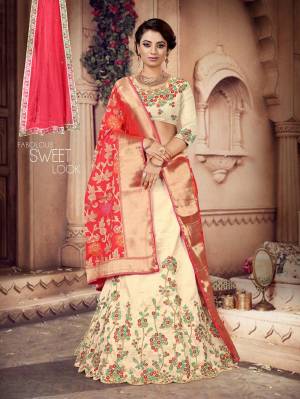 For A Pretty Festive Look, Grab This Heavy Embroidered Designer Lehenga Choli With Two Dupatta. This Lehenga Choli Is Silk Based Paired With A Very Pretty Jacquard Silk Dupatta And Another Net Fabricated Dupatta. Its Blouse And Lehenga Are Beautified With Contrasting Thread & Jari Embroidery. Buy Now. 
