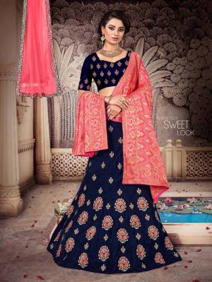 Grab This Heavy Designer Lehenga Choli For The Upcoming Festive And Wedding Season Which Comes With Two Dupattas. This Pretty Lehenga Choli IS Fabricated On Art Silk Paired With A Jacquard Silk Dupatta And Another Net Fabricated dupatta. 