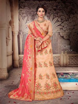 For A Pretty Festive Look, Grab This Heavy Embroidered Designer Lehenga Choli With Two Dupatta. This Lehenga Choli Is Silk Based Paired With A Very Pretty Jacquard Silk Dupatta And Another Net Fabricated Dupatta. Its Blouse And Lehenga Are Beautified With Contrasting Thread & Jari Embroidery. Buy Now. 