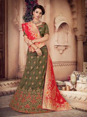 Grab This Heavy Designer Lehenga Choli For The Upcoming Festive And Wedding Season Which Comes With Two Dupattas. This Pretty Lehenga Choli IS Fabricated On Art Silk Paired With A Jacquard Silk Dupatta And Another Net Fabricated dupatta. 