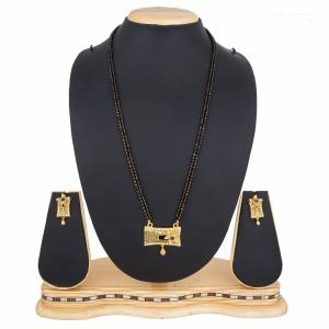 Rich And Elegant Looking Mangalsutra Set Is Here In Golden Color. This Pretty Set Can Be Paired With Any Colored Attire. Buy Now.