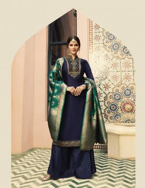 Enhance Your Beauty Wearing This Designer Straight Cut Suit In Navy Blue Color Paired With Contrasting Teal Green Colored Dupatta. Its Embroidered Top Is Fabricated On Satin Georgette Paired with Santoon Bottom And Banarasi Art Silk Dupatta. 