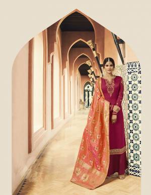 Bright And Visually Appealing Color Pallete Is Here With This Designer Straight Cut Suit In Dark Pink Color Paired With Contrasting Orange Colored Dupatta. Its Top Is Fabricated On Satin Georgette Paired With Santoon Bottom And Silk Based Dupatta. It Is Beautified With Attractive Embroidery Over The Top.
