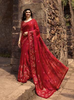 Adorn The Pretty Angelic Look In This Designer Red Colored Saree Paired With Red Colored Blouse. This Saree IS Georgette Based Paired With Jacquard And Art Silk Fabricated Blouse. All Its Fabrics Are Light Weight And easy To Carry All Day Long. 