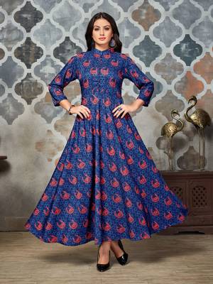 Grab This Pretty A-Line Patternred Designer Readymade Kurti In Blue And Red Color. This Kurti Is Polyester Based Fabric Which Is Light In Weight And Easy To Carry All Day Long. 