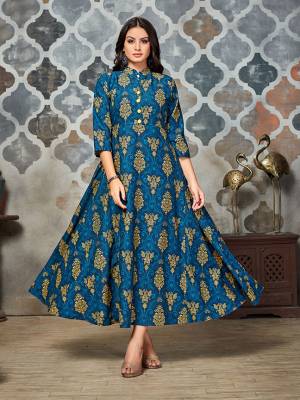 Grab This Pretty A-Line Patternred Designer Readymade Kurti In Blue And Yellow Color. This Kurti Is Polyester Based Fabric Which Is Light In Weight And Easy To Carry All Day Long. 