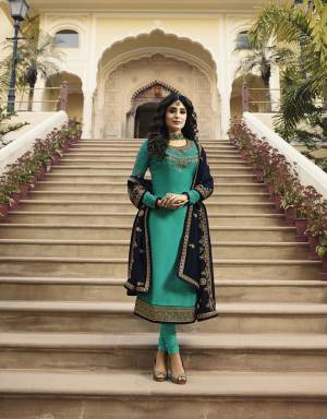 Here Is A Very Pretty Designer Straight Cut Suit In Sea Green Color Paired With Contrasting Navy Blue Colored Dupatta . Its Top Is Fabricated On Satin Georgette Paired With Santoon Bottom And Georgette Fabricated Dupatta. This Suit Is Light Weight, Durable And Easy To Care For. 