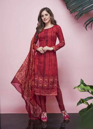 For Your Casual Wear, Grab This Pretty Dress Material In Red Color. Its Top And Bottom Are Fabricated On American Crepe Paired With Chiffon Fabricated Foil Art Dupatta. Its Is Beautified With Prints All Over.