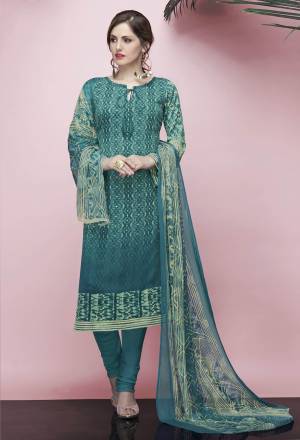 For Your Casual Wear, Grab This Pretty Dress Material In Turquoise Blue Color. Its Top And Bottom Are Fabricated On American Crepe Paired With Chiffon Fabricated Foil Art Dupatta. Its Is Beautified With Prints All Over.