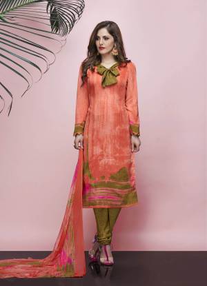 Simple And Elegant Looking Suit For Your Casual Wear Is Here In Orange Color Top And Dupatta Paired With Pear Green Colored Bottom, This Dress Material Is Fabricated On Ameerican Crepe Paired With Chiffon Dupatta. Buy This Now.