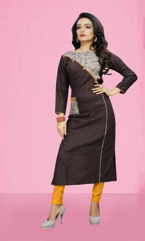 For Your Semi-Casuals, Grab This Readymade Kurti In Dark Brown Color Fabricated On Cotton Slub Beautified With Prints. It Is Soft Towards Skin And Easy To Carry All Day Long. 