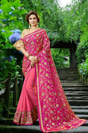 Catch All The Limelight Wearing This Heavy Designer Saree In Fuschia Pink Color Paired With Beige Colored Blouse. This Saree Is Fabricated Art Silk And Georgette Paired With Art Silk Fabricated Blouse. It Has Heavy Embroidered Pallu And Lace Border. 