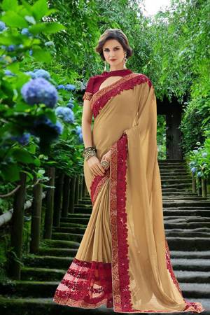 Simple And Elegant Looking Designer Saree Is Here In Beige Color Paired With Maroon Colored Blouse. This Saree Is Fabricated On Chiffon Paired With Art Silk Fabricated Blouse. Both Its Fabric Are Light Weight, Durable And Easy To Care For. 