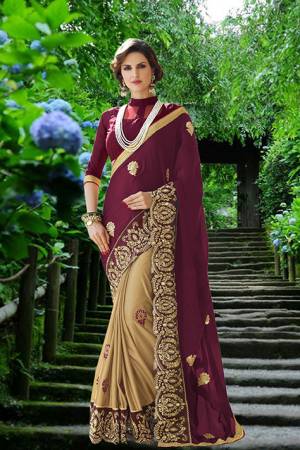 Get Ready For The Upcoming Party At Your Place With This Beautiful Designer Saree In Wine And Beige Color Paired With Beige Colored Blouse .This Saree Is Georgette Based Paired With Art Silk Fabricated Blouse. It Is Light Weight And Easy To Carry Throughout The Gala.