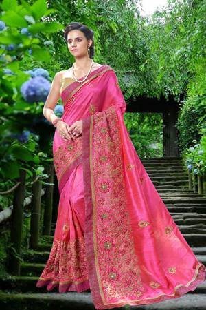 Attractive Color Is Here With This Designer Saree In Fushia Pink Color Paired With Beige Colored Blouse. This Saree And Blouse are Fabricated On Art Silk Beautified With Heavy Work. This Attractive Saree Will Give Your Personality An Amazing Look Like Never Before.