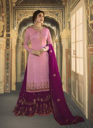 Shades In Pretty Purple Are Here With This Designer Sharara Suit In Lavendor Colored Top Paired With Purple Colored Bottom And Dupatta. Its Top Is Fabricated On Satin Georgette Paired With Georgette Bottom And Dupatta. Buy This Lovely Suit Now.