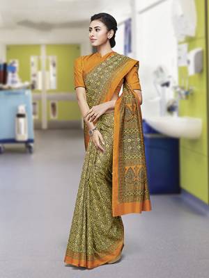 No More Worry For What To Wear At Your Place, Grab This Faux Georgette Fabricated Saree And Blouse Beautified With Prints All Over. This Saree Can Be Used As Uniform At Different Places Like Airports, Hospitals And Hotels. 
