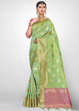 You Will Definitely Earn Lots Of Compliments In This Rich And Elegant Silk Based Saree, This Saree And Blouse are Beautified With Heavy Weave All Over, Giving It An Attractive Look