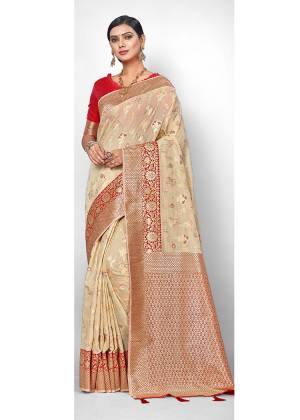This Festive Season Look The Most Elegant Of All Wearing This Designer Silk based Saree Beautified With Weave All Over. This Saree Is Light Weight, Durable And Easy To Carry Throughout The Gala