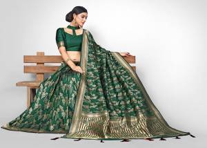 You Will Definitely Earn Lots Of Compliments In This Rich And Elegant Silk Based Saree, This Saree And Blouse are Beautified With Heavy Weave All Over, Giving It An Attractive Look