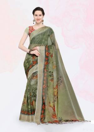 Add This Pretty Saree For Your Semi-Casuals With This Printed Saree Fabricated On Linen Paired With Linen Fabricated Blouse. Its Fabric And Color Ensures Superb Comfort All Day Long. Buy Now.