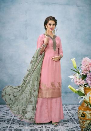Look Pretty In This Designer Embroidered Suit In Pink Color Paired With contrasting Lakhnavi Embroidered Mint Green Colored Dupatta. Its Top Is Fabricated On Banarasi Jacquard Silk Paired With Santoon Bottom And Net Fabricated Dupatta. 