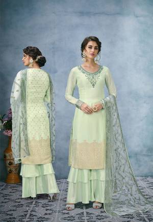 Subtle Shades Always Gives A Rich And elegant Look To Your Personlity. So Grab This Designer Suit In Light Green Color. Its Top Is Fabricated On Banarasi Jacquard Silk Paired With Santoon Bottom And Lakhnavi Embroidered Net Fabricated Dupatta. All Its Fabrics Are Soft Towards Skin And Esnures Superb Comfort All Day Long. 