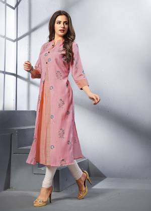 Look Pretty In This Readymade Pink Colored Kurti Fabricated On Rayon. This Kurti Is Light Weight, Soft Towards Skin And Easy To Carry All Day Long For This Summer. 