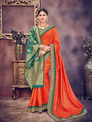Look your ethnic best by wearing this Orange color two tone silk fabrics saree. Ideal for party, festive & social gatherings. this gorgeous saree featuring a beautiful mix of designs. Its attractive color and heavy designer silk saree, stone design, beautiful floral design Saree along with silk jacquard dupatta work over the attire & contrast hemline adds to the look. Comes along with a contrast unstitched blouse.