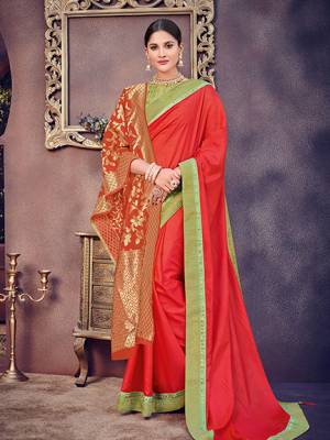 Wear this Red color two tone silk fabrics saree. Ideal for party, festive & social gatherings. this gorgeous saree featuring a beautiful mix of designs. Its attractive color and heavy designer silk saree, stone design, beautiful floral design Saree along with silk jacquard dupatta work over the attire & contrast hemline adds to the look. Comes along with a contrast unstitched blouse.