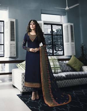 Enhance Your Personality Wearing This Heavy Designer Straight Cut Suit In All Over Navy Blue Color. Its Top Is Satin Georgette Based Paired With Santoon Bottom And Heavy Embroidered Dupatta Fabricated On Georgette. Buy This Suit Now.
