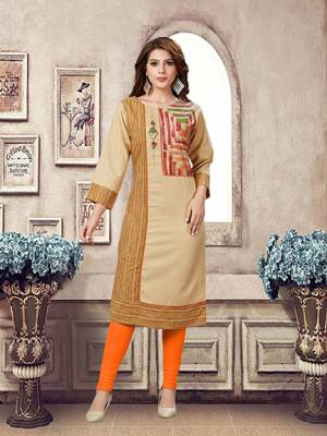 Simple And Elegant Looking Readymade Kurti Is Here In Beige Color Fabricated On Linen. This Fabric Gives A Rich Look And Is Comfortable. 