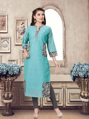 For Your Office Wear, this Formal Kurti Is Perfectly Suitable. This Readymade Kurti Is In Turquoise Blue which IS Chanderi Fabricated Beautified With Prints. 
