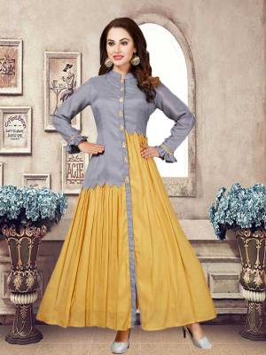 Adorn A Pretty New and Unique Look With This Readymade Designer Kurti In Grey And Yellow Color Fabricated On Muslin. It Is Light Weight, Durable And Easy To Care For. 