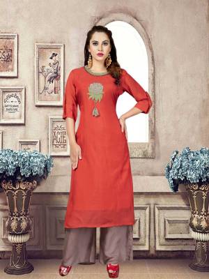 Grab This Designer Readymade Kurta Set In Red Colored Top Paired With Grey Colored Bottom. Both The Top And Bottom Are Fabricated On Mulsin Which Are Soft Towards Skin And Easy To Carry All Day Long. 
