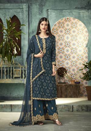 Grab This Attractive Designer Plaazo Suit In Blue Color. Its Top Is Fabricated On Georgette Paired With Santoon Bottom And Chiffon Fabricated Dupatta. Its Attractive Foil Print And Embroidery Will Give Your Personality An Unique Look Like Never Before. 