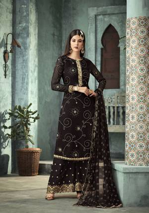 For A Bold And Beautiful Look, Grab This Heavy Designer Plazzo Suit In Black Color. It Is Georgette Based Paired With Embroidered Santoon Bottom And Chiffon Fabricated Dupatta. Buy This Amazing Suit Now.
