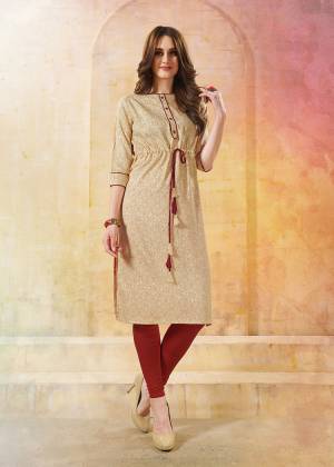 Beat The Heat This Summer With This Easy go Readymade Kurti In Beige Color Fabricated On Rayon. It Is Light In Weight And Easy To Carry All Day Long. 